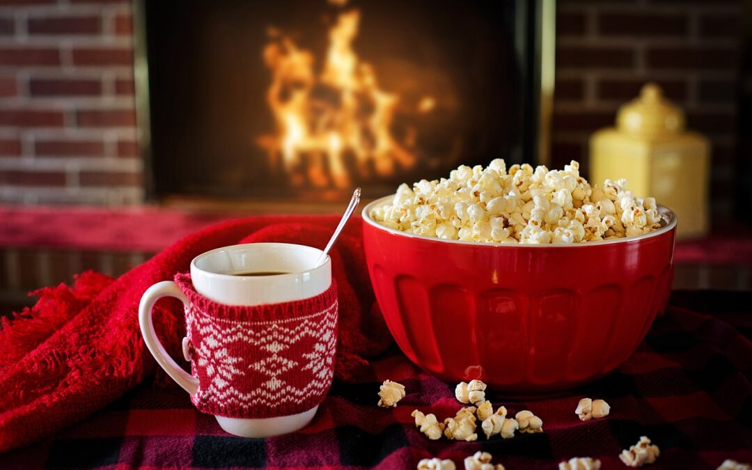 an image of coffee and snacks in front of a fire during the holidays in indiana